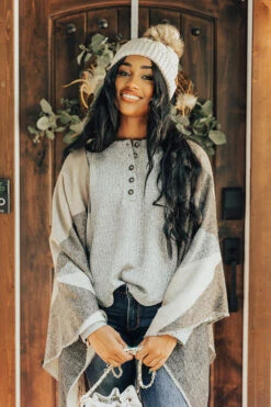 Denver Debut Poncho In Black 11 Denver Debut Poncho In Black -Chic Essence 2108067364000 2021090208401400 132cbd9ddenver debut poncho in black