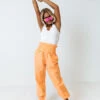 The Huxley High Waist Windbreaker Pants In Neon Orange 1 The Huxley High Waist Windbreaker Pants In Neon Orange -Chic Essence 2203014154000 2022032322124900 0dfd9936the huxley high waist windbreaker pants in neon orange