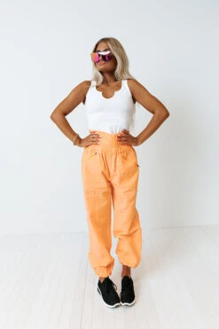 The Huxley High Waist Windbreaker Pants In Neon Orange 11 The Huxley High Waist Windbreaker Pants In Neon Orange -Chic Essence 2203014154000 2022032322124900 26adc796the huxley high waist windbreaker pants in neon orange