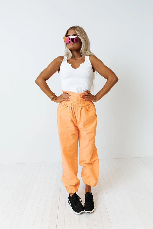 The Huxley High Waist Windbreaker Pants In Neon Orange 6 The Huxley High Waist Windbreaker Pants In Neon Orange - Image 4