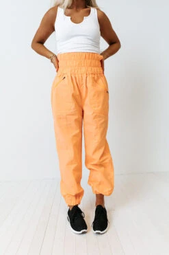 The Huxley High Waist Windbreaker Pants In Neon Orange 12 The Huxley High Waist Windbreaker Pants In Neon Orange -Chic Essence 2203014154000 2022032322124900 50b77c09the huxley high waist windbreaker pants in neon orange