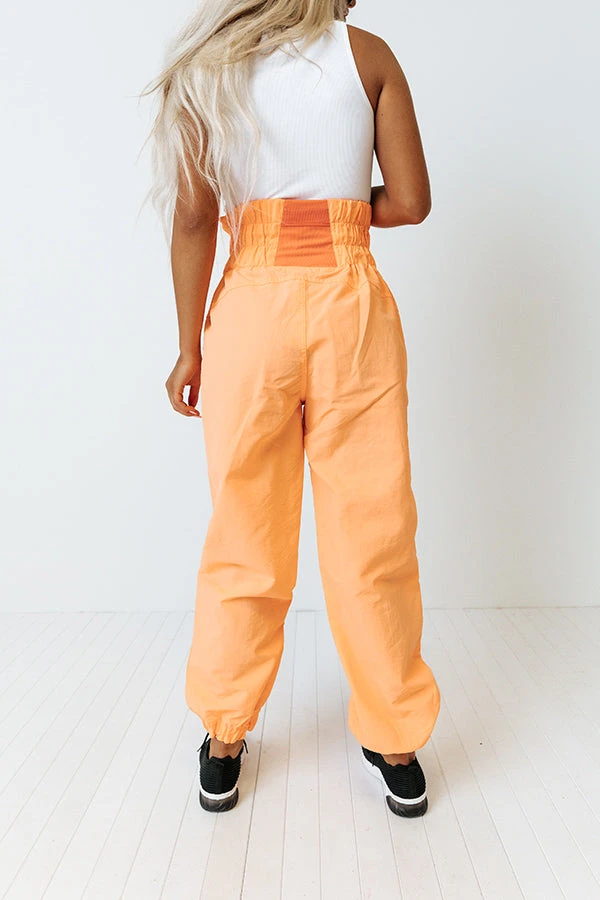 The Huxley High Waist Windbreaker Pants In Neon Orange 8 The Huxley High Waist Windbreaker Pants In Neon Orange - Image 6