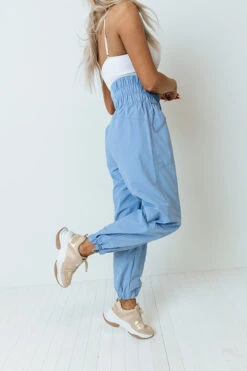 The Huxley High Waist Windbreaker Pants In Airy Blue -Chic Essence 2203017834000 2022032413311500 7a7febdcthe huxley high waist windbreaker pants in airy blue