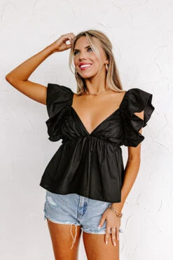 Stay Here Awhile Peplum Top In Black